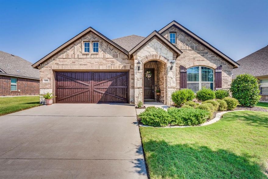 Welcome home to 539 Windrow!!  Step inside to this open concept home with gorgeous hard wood flooring, granite throughout the eat-in kitchen, a cozy fireplace in the living area with plenty of room to entertain.  Over-sized primary bedroom located at back of the home lends privacy and luxury with the suite bath.  2 other bedrooms at front of the house can be used for guests or an office space.  Finish your tour in the beautifully landscaped backyard complete with a wood privacy fence and a cozy porch to enjoy slow mornings or sunsets.  Bring your buyers by today!