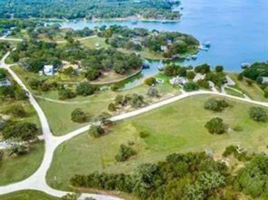 Half an Acre lake view lot located in the Rustling Oaks Subdivision on the Streetman side of Richland Chambers Lake. This lot offers the opportunity to build a custom home with a minimum requirement of 1600 square feet. The community features a boat ramp for residents' use, facilitating access to the lake. Additionally, the property is governed by a homeowners association, ensuring community standards and amenities are maintained. Situated in a tranquil and private setting, the location provides easy access to Interstate 45, offering convenient connectivity to surrounding areas. Survey in Transaction Desk.