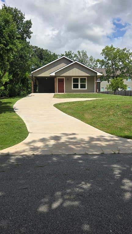 Photo of 1210 S Travis Avenue, Denison, TX 75021 (MLS # 21362488)