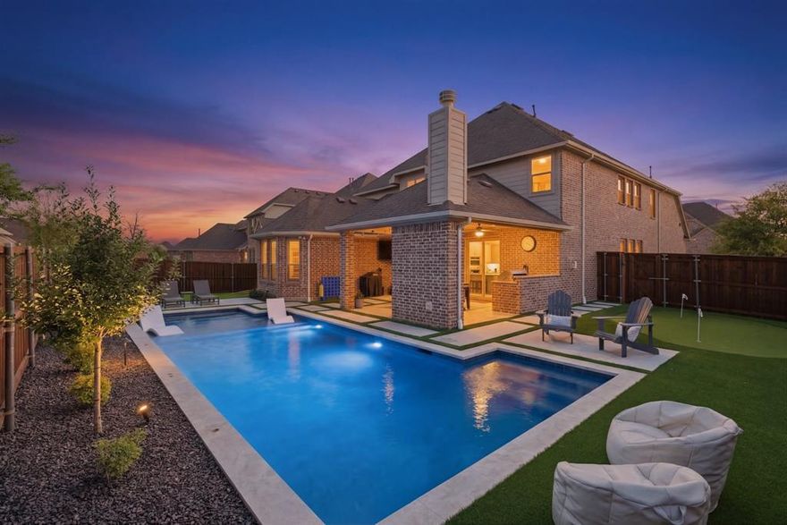 Rarely does a home of this caliber come to market. Completely turnkey and tucked within the gated section of Auburn Hills in highly sought-after Prosper ISD, this exceptional 4-bedroom, 3.5-bath residence delivers a true resort-style living experience with elevated, designer finishes throughout. Thoughtfully curated with both style and functionality in mind, the open-concept floor plan is enhanced by designer lighting and sophisticated details at every turn. The main level features a private front office, spacious laundry room, and an effortless flow between the kitchen, living, and dining spaces, ideal for both intimate gatherings and large-scale entertaining. The chef’s kitchen is a standout, complete with a statement center island with breakfast bar seating, walk-in pantry, and dining area, all overlooking the inviting living room anchored by a cozy fireplace. The primary suite, privately situated on the main level, offers a spa-inspired retreat with dual vanities, an oversized frameless glass shower, and a generous walk-in closet. Upstairs, you’ll find three additional bedrooms, a versatile flex space, and a dedicated media room, perfectly suited for guests, family living, or multigenerational needs. Step outside to your private backyard oasis, where luxury continues with a sparkling in-ground pool, relaxing spa, covered patio, and fully fenced yard—crafted for both entertaining and unwinding in complete privacy. Perfectly positioned just minutes from US-380, Hwy 75, and McKinney’s premier shopping and dining, this home offers a seamless blend of convenience and refined living. Residents of Auburn Hills enjoy access to resort-style amenities including two community pools, playground, greenbelts, and scenic walking trails—enhancing the lifestyle this exceptional home provides.