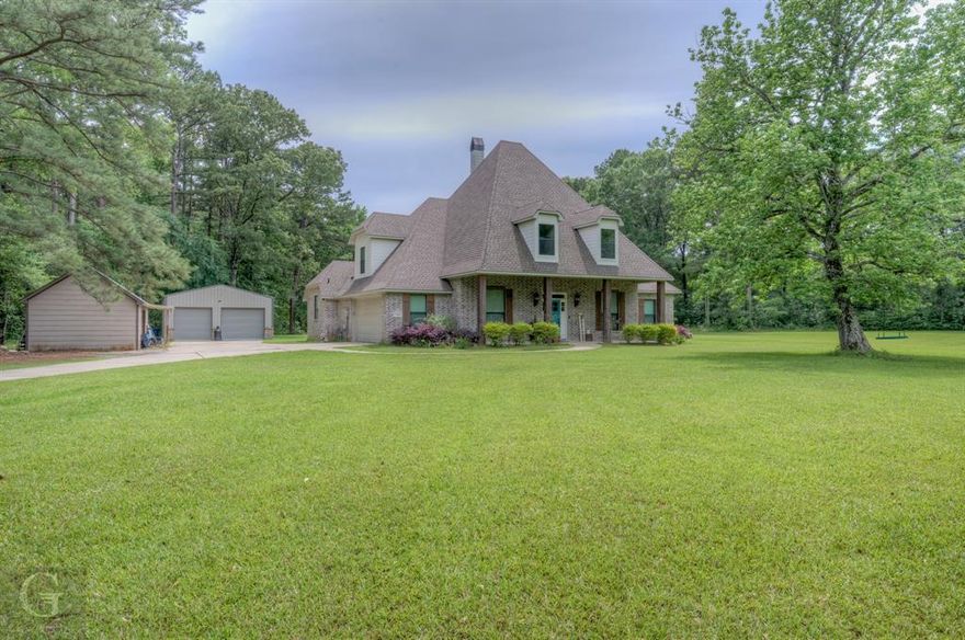 Rare find on 7 acres. Hot water & gas hookup on the exterior of the home. Tankless hot water heater. Insulated garage door. 2 workshops with electric: 24x30 & 15x25. The neighbors are always friendly. Part of the upstairs can be used as a 4th bedroom. This home sits behind the home that has road frontage on Shirley Francis. This home is not in a flood zone. Will come with a 1 year Guard Home Warranty with a favorable offer to the seller.