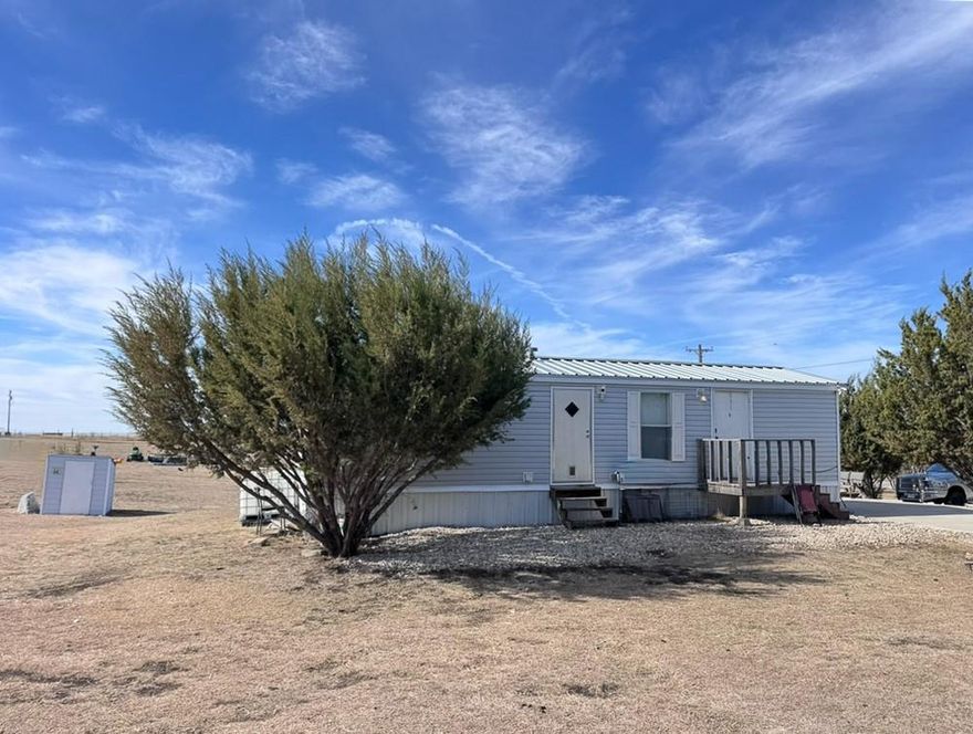 Escape to the quiet outskirts of Stephenville, the Cowboy Capital of the World, with this versatile 1-acre gem. Located on a peaceful private road, this property offers the perfect blend of move-in-ready comfort and future potential.

The heart of the property features a cozy, 640 sq ft, 1-bedroom, 1-bathroom single-wide home, highlighted by a front porch—the ideal spot for morning coffee or watching the Texas sunset. A clean, professional 80x20 concrete drive leads you to the standout feature: a 20x25 detached 2-car garage and shop. Fully equipped with electricity, this space is a dream for hobbyists, mechanics, or anyone needing secure storage for their gear and toys. You will also find 2 RV hookups on the property.

With a full acre at your disposal, you have the freedom to expand. Whether you’re looking to build your forever home later, start a garden, or simply enjoy the elbow room, this property is a blank canvas.