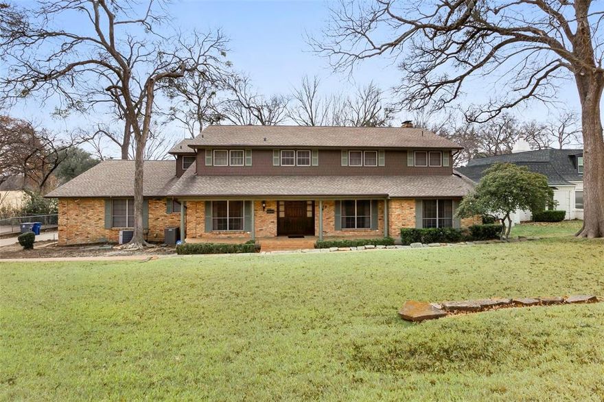A rare opportunity to own an architecturally significant 1960s custom home overlooking the 2nd fairway of the Golf Club of Dallas. Set within a quiet neighborhood known for tree-lined streets and architect-designed residences, this property offers timeless craftsmanship, solid construction, and exceptional renovation potential. Original mid-century details remain throughout, including brick flooring in the entry and sunken living room, tongue-and-groove paneling, 6-panel solid wood doors with brass and chrome hardware, and striking period light fixtures. Oversized windows along the back of the home bring in abundant natural light and frame long, uninterrupted views of the fairway. The forward-thinking floor plan offers excellent flexibility: the primary suite is upstairs with generous proportions and elevated views, while two additional spaces—one on the main level adjacent to a full bath and another large upstairs bedroom with en-suite access—could also function as primary suites. Additional highlights include a dedicated home office with lighted cabinetry, a butler’s pantry, a wet bar in the living room, in-law or service quarters with a bath, and closets with custom built-ins. While the interior remains largely original and well maintained, the exterior has been updated with Tyvek wrapping, Hardie board siding, and fresh paint, creating a durable envelope for future improvements. With its architectural pedigree, golf-course frontage, and impressive potential, this home presents an exciting opportunity in an exceptional setting.