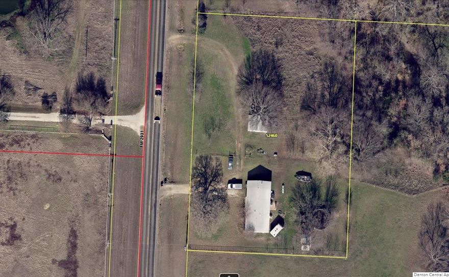 Investors welcome.  Beautiful property on FM 2931 with 300 feet of road frontage in desirable Pilot Point.  Low tax rate, perfect spot to renovate or build.  Most value is placed in the land.  Home needs demo or major renovations including roof, new septic, interior ceiling and flooring, no central heat or air.  500sq foot barn and mature trees.