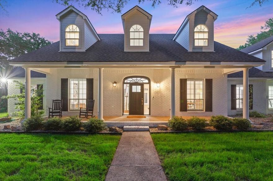 Tucked away on a quiet 1.9-acre cul-de-sac lot in Hidden Valley and surrounded by mature trees and forest, 1061 Hidden Valley Court offers rare privacy with exceptional space and upgrades throughout. Recently remodeled, this home features an open-concept main living area anchored by a chef’s kitchen with a large center island, a six-burner stainless steel range, new cabinetry, and Taj Mahal quartzite countertops. The main level also includes a breakfast space, a formal dining room, and a second formal living area. Additional downstairs highlights include a walk-in pantry with quartzite counters and open shelving, an executive office, an oversized utility room, and a fifth bedroom currently used as a workout room. The isolated primary suite features a spacious walk-in closet, dual vanities, a garden tub, a tiled shower, and private access to the back patio, which is wired for a hot tub. A recent addition above the garage provides a third living area, ideal for recreation or media space, along with an oversized bedroom and full bath with hall access. Upstairs in the original portion of the home are two additional bedrooms, each with its own en suite bathroom, plus an additional living space dedicated to these bedrooms. The backyard is a true retreat, featuring an extended patio, a recently built swimming pool with a tanning ledge, and a guest house with a kitchen, full bath, and living and sleeping areas. Additional amenities include a circular drive, an extended driveway, an expanded three-car garage with workshop potential, a 50-amp 240-v car plug-in in the garage, a propane tank for appliances, updated lighting, and luxury vinyl plank flooring. Located in Midway ISD, this property offers 5+ bedrooms, multiple living areas, 5+ bathrooms, and unmatched privacy in Hidden Valley. Schools: South Bosque, River Valley Middle School, and Midway High School.