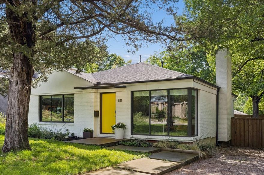 Stylishly restored and thoughtfully reimagined, this West Kessler modern cottage pairs clean architectural lines with effortless everyday livability. Behind its charming façade, a comprehensive renovation in 2011—spanning flooring, walls, windows, electrical, plumbing, roof, insulation, fixtures, and finishes—delivers both peace of mind and elevated design, brought to life by the creative team at Punchworld Studio.
Inside, dramatic floor-to-ceiling pane-less windows bathe the interiors in natural light, blurring the line between indoors and out. The sleek kitchen serves as the heart of the home, showcasing crisp white lacquer cabinetry, premium stainless steel appliances, and quartz countertops—perfectly suited for both daily living and entertaining.
And for those who love to host, there’s a moment of surprise: a hidden bar discreetly tucked behind a custom bookshelf—because, after all, books are simply better with bourbon. The serene primary suite offers a true retreat, complete with a tranquil Zen garden, a spacious walk-in closet, and a spa-inspired bath finished with refined quartz surfaces. Efficient use of space throughout including a generous walk-in closet.
The home offers a coveted two car attached garage and a spacious storage unit was added in May 2025. 
All of this in a stellar West Kessler location just blocks from the acclaimed Stevens Park Golf Course, 2 miles to Bishop Arts and 5 miles to DT Dallas!