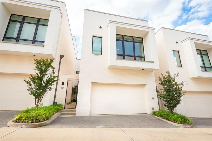 Elegant Townhome with Private Backyard Oasis. Step into this stunning townhome through a charming private courtyard that leads to a welcoming foyer. Inside, you will find a spacious, light-filled living and dining area, adorned with beautiful light hardwood floors and large windows that frame views of the serene private backyard oasis, complete with lush turf grass.
The open-concept kitchen seamlessly connects to the living area and boasts a sleek quarter waterfall island, a gas cooktop, premium Bosch appliances, and a Thermador refrigerator and freezer. The first floor is thoughtfully designed with a powder bath and a two-car garage, featuring epoxy flooring and an electric charging station. 
Ascend to the second floor, where the hardwood floors continue into the luxurious master suite. This bright and airy retreat offers electric shades for convenience, a spa-like bathroom with dual vanities, a freestanding tub and shower combination clad in marble flooring and walls, and an expansive custom-fitted closet.
Additionally, this home features two generously-sized bedrooms, each with its own private bath. With ample space, abundant natural light, and plenty of storage, this home perfectly blends comfort and elegance for modern living.