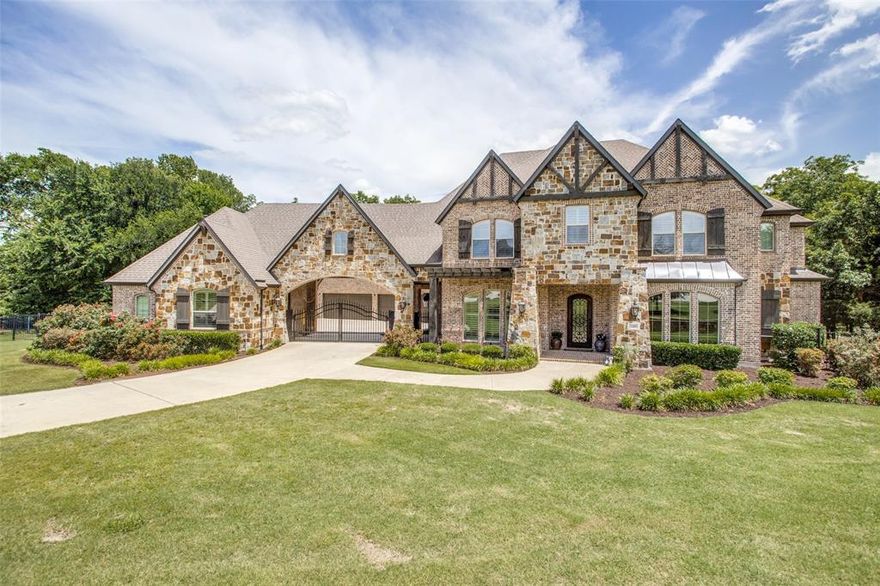 This exquisite home offers ultimate privacy and outdoor entertaining in a park-like setting on over 3 acres in the heart of Fairview. With light-filled interiors, high ceilings & an open floor plan, this home has it all! Chef-inspired kitchen including oversized island, wine cellar & breakfast room opens to great rm w fireplace and wall of windows overlooking the backyard. The downstairs primary suite includes luxurious bath & attached exercise rm. Additional bedroom also downstairs. Upstairs features three en-suite bedrooms, game room & media room. The backyard oasis with a private spring-fed fishing pond is a highlight of the home. Fabulous covered patio with fireplace & grill leads to an infinity pool with spa and a stone fire-pit that overlooks beautiful pond and lush landscaped yard. Additional features include four-car garage, dog kennel & detached casita with kitchenette & bath. This one-of-a-kind property in Lovejoy ISD is the perfect retreat in an exceptional location.