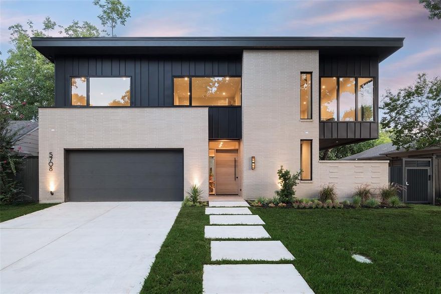 A Devonshire NEW CONSTRUCTION showplace built by K E Homes & designed by MAREK Architecture. Interior design by NYTimes featured Josh Collins. The C shaped floor plan offers privacy yet has walls of glass with views of the cantilevered covered patio & turfed lawn with pool & spa. The chic floor plan has a brick walled foyer, dining room with glass sliding doors, study, guest suite & primary suite all downstairs. Upstairs has 3 bedrooms, 3 baths & game room. The dream kitchen has Quartzite counters, rift cut white oak cabinets,onyx wet bar,Sub-Zero Wolf package,wine fridge & ice maker.The living room opens to the pool & offers 11 ft ceilings & a sleek gas fireplace with Venetian plaster wall. The powder bath was hand painted by artist Leah Michelle.Primary bath features natural light, leathered marble counters,Terrazzo floors & private indoor-outdoor shower.Level 5 walls, Visual Comfort Kelly Wearstler lighting, 7” oak flrs, foam insulation,standing seam metal roof & MAC Metal Siding.