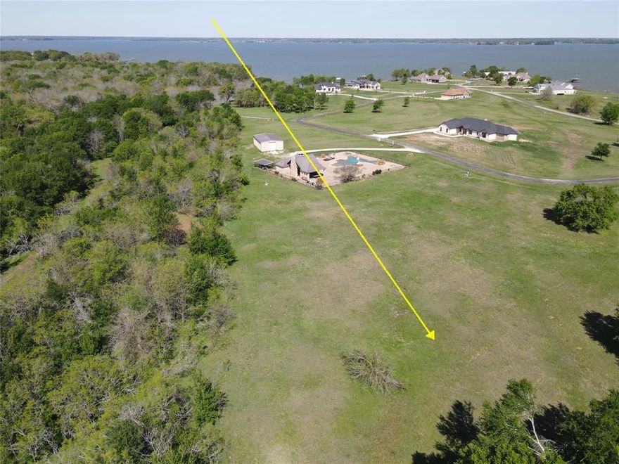 Big land, big possibilities, and lake life without the waterfront price tag—this 4-acre corner lot in Sandy Cove checks all the boxes. With trees lining one side, a peaceful creek bed, and subtle lake views out front, Lot 37 gives you the perfect mix of privacy, scenery, and space to build exactly what you want.

Tucked inside a quiet, gated community, Sandy Cove leans into that “escape to nature” feel with private ponds, walking trails, and a small nature reserve that makes everyday life feel a little more unplugged. But you’re not giving up convenience—residents enjoy a private pool, pavilion, grill area, and boat ramp, so getting out on the water is always easy.

And here’s the best part—you’re just steps from Richland Chambers Lake, one of Texas’ largest and most loved lakes. Build your dream, spread out, and enjoy lake living your way—without the premium price of waterfront.