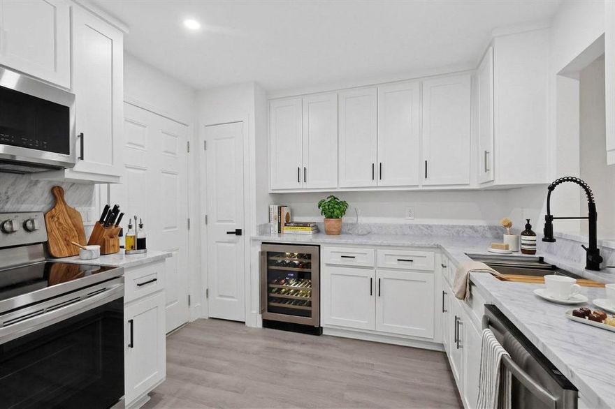 Unit was just taken down to sheetrock and remodeled completely. New cabinets, Carrera marble counter tops, stainless steel appliances, wine frig, new doors, new window treatments, doors, tile, fixtures, lights, wall texture and all hardware. $75,000 remodel with nothing sparred. Like a new unit and a must see. Priced to sell. GREAT UPSTAIRS CONDO ON THE CREEK. SET BACK OFF ROYAL, VERY QUIET AND PRIVATE. FRONT & REAR ENTRIES. GREAT BALCONY OVERLOOKING CREEK WITH GREAT WALL OF TREES IN FRONT OF YOU. HOA PAYS ALL BILLS, BUT YOU CONTROL HEAT & A.C.