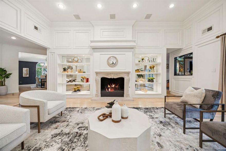French-inspired elegance and everyday comfort blend beautifully in this updated, single-story gem on 0.38 acres. Recently refreshed with a new roof, refinished hardwood floors, new carpet, and a new fence, this home is back on the market and better than ever.

A vaulted formal living room creates a striking first impression with its fireplace and custom built-ins, offering a light-filled heart of the home. The marble-clad chef’s kitchen features a center island, stainless appliances, and a sunny breakfast nook, opening to a cozy den and a chic mirrored bar—perfect for entertaining in style.

The primary suite provides a private retreat with dual bathrooms and generous closet space, while additional living areas flex easily for media, work, or relaxation.

Outside, two distinct spaces offer a rare mix of charm and resort-style living. One side of the property showcases a tranquil woodland garden with raised beds and a whimsical chicken coop, while the other side boasts a sparkling pool and spa, built-in bar, and covered outdoor living area—ideal for both lively gatherings and quiet evenings at home.

Thoughtfully updated and meticulously maintained, this home blends timeless design with fresh improvements, ready to welcome its next chapter.
