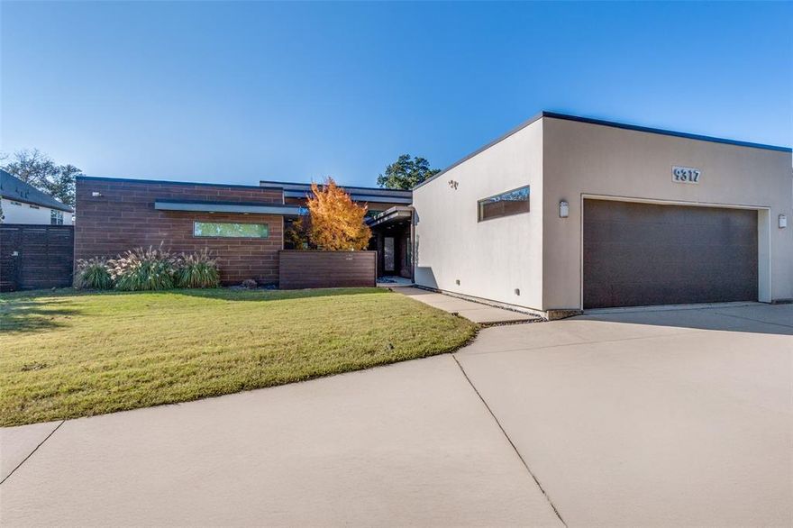 Meticulously designed for Modern elegance, green living and efficient use of space. This amazing one story, custom built masterpiece is Dallas living at its best.  A Porcelanosa custom kitchen with touch sensitive electric opening cabinets, Bosch Induction cooktop, Miele built in coffee maker, side by side SS refrigerator freezer all open to the living, dining areas. A wall of sliding doors showcase the patio with phantom  screens overlooking the saltwater pool and oversized lot.  Museum level walls for the quiet retreat. This is an ICF house with walls that are 6 inches of concrete with 2 inches of foam on the inside and outside. The primary bedroom has a resort type feel with radiant barrier flooring in the bathroom, an oversized custom closet, Jacuzzi see through tub with ceiling mount & a huge open walk-in shower. Other features: oversized garage, Epoxy floor, workshop in garage with shelving, sink & under HVAC; Tesla Powerwall, Tesla fast charger & 2 standard electric vehicle outlets, water softener and exterior drains. Come tour this beautiful home.