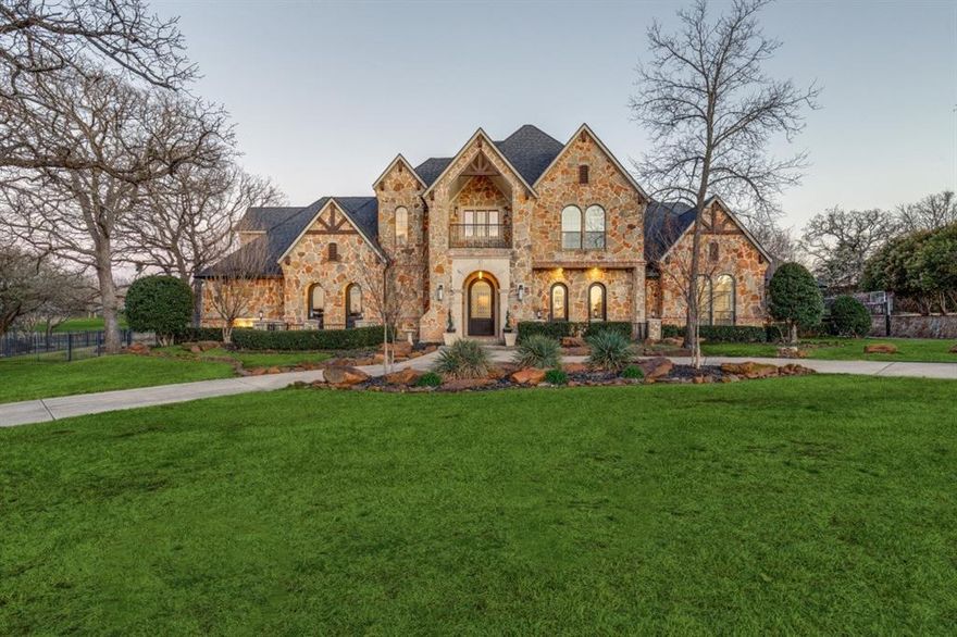 Discover this beautifully updated luxury estate nestled on the prestigious golf course in the exclusive guard-gated community of The Estates at Tour 18. As you pass through the gates, you're welcomed by a breathtaking neighborhood featuring mature trees, grand estates, and stunning greens, setting the stage for an unparalleled living experience.
This exquisite 5 BR, 5 BA home is designed for both entertaining and everyday luxury. Upon entry, you're greeted by expansive views of the serene backyard, complete with a sparkling salt water pool and lush landscaping. The chef's kitchen is a true masterpiece, featuring state-of-the-art Stainless Steel appliances, a six-burner gas stove, wine storage, and an over sized quartzite island, perfect for meal prep and gathering. The open-concept design allows natural light to flood the space, creating a bright and inviting atmosphere. Hand-scraped hardwood floors and stunning marble tiles give this home a rich, traditional feel. 
The home also boasts a formal dining room, cozy breakfast nook, tons of storage, dedicated office with built-ins, and secondary office space-ideal for remote work or study. Upstairs, a media room and game room with a private kitchenette provides the perfect setting for relaxation and entertainment. 
Three of the five bedrooms feature private, ensuite baths and all have spacious walk-in closets, ensuring ultimate comfort and privacy. For car enthusiasts, the 4 car garage includes epoxy floors additional space for a golf cart. This space allows for ultimate organization. 
Ideally located just 25 minutes from the DFW Airport, this home offers convenient access to shopping, dining, and nightlife. It is part of the highly acclaimed Argyle ISD and close to Liberty Christian School, making it an exceptional choice for families. 
Don't miss your chance to call this stunning estate home-Schedule a private showing today!