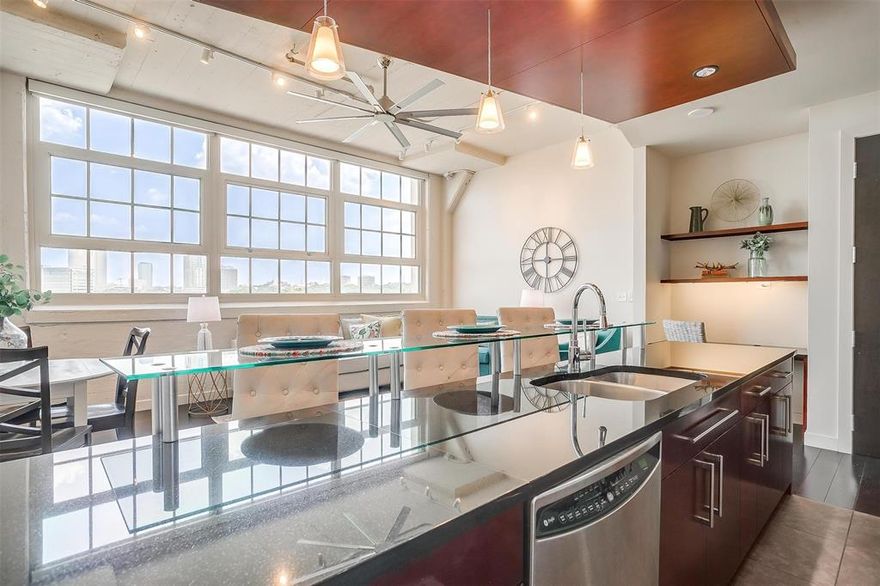 Discover luxury at One Montgomery Plaza with this stunning 2-bed, 2-bath condo offering 1,384 sqft of meticulously designed space. Hardwood floors guide you through an open floor plan illuminated by wall-to-wall windows, showcasing breathtaking downtown views. The chef's kitchen features stainless steel appliances, granite countertops, and ample storage. Retreat to spacious bedrooms with ensuite baths and walk-in closets. Indulge in unmatched amenities: state-of-the-art gym, 14-seat theater, owner's lounge, resort-style pool deck with cabanas, fire pits, outdoor shower, and multiple living spaces. Secure parking with 2 deeded spaces (3107 & 3108) 3rd floor in the garage. Within walking distance or a short drive to restaurants, museums, shopping, and the best nightlife in DFW, this condo seamlessly blends luxury, comfort, and convenience. Schedule a showing today!