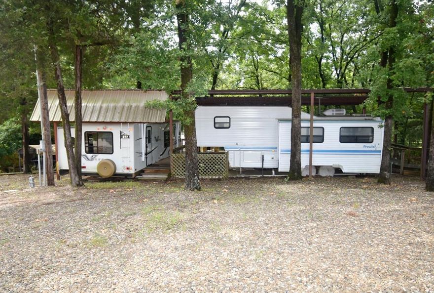 3 Lots in White Oak Shores Subdivision on Legendary Lake Fork. 2 RV sites, with full hook ups for your weekend or long term adventures! Included with this sale are 2 RVs, the first one is a 1995 Prowler by Fleetwood 5th wheel, and second one is a 2013 VLite pull behind by Flagstaff. Additional features are covered decking connecting the 2 RVs, a sturdy metal covers for both of the RVs, a spray foam insulated shed for laundry and storage and a stone fire pit. There is a full sized water heater, upgraded exterior water shut offs for each RV. Community includes private boat ramp and fishing pier to World Famous Lake Fork, as well as community pool, playground and clubhouse for property owners only. HOA fees are approximately 40 dollars per month and include full use of the facilities. There is something for the entire family here! Buyer to verify any and all information.