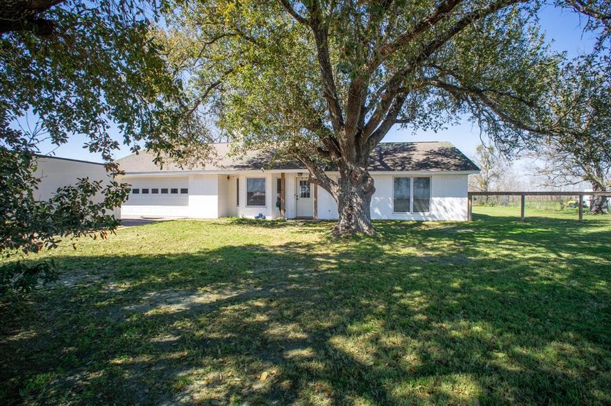 Come check out this beautiful 3 bedroom, 2 bath home on .67 of an acre. Home has been newly renovated with all new windows, new flooring, completely new open kitchen and new septic system all with in the last 2 yrs.  It's a beautiful home with semi open floor plan. Living room features vaulted ceilings and a wood burning stove along with built in shelves. Primary bedroom has 2 large walk in closets!! New paint on the exterior and a new fenced backyard great for kiddos and sweet pets with so much space to enjoy!! Beautiful shade trees and come relax under covered back porch while you watch those beautiful Texas sunsets!!