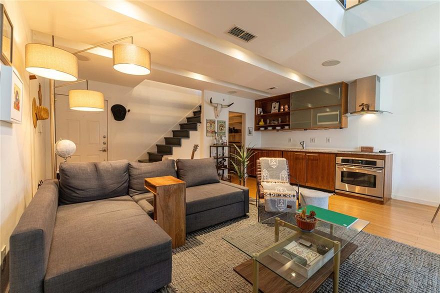 Welcome to urban living at its finest in Bryan Place and this Eastside split level loft. The perfect pad for your first-time buyer or investor looking for another rental. The unit was completely renovated in 2017 to be a true one-of-a-kind in the complex. Living, dining, kitchen, study-pantry down and bed-bath up for a nice divide in your little paradise on the edge of Downtown Dallas. Don't let 644 square feet scare you, this lowrise walk-up residence offers a perfect blend of modern comfort and city convenience.

Step inside to discover vaulted ceilings and a sound system that enhance the open and airy feel of the space. The western exposure floods the condo with natural light highlighting the hardwood floors and recessed lighting. Dual pane windows with treatments provide both privacy and picturesque city skyline views.

The galley kitchen is a chef's delight, featuring granite countertops, stainless steel appliances, an electric stove, and a range hood and dual built-in mini fridges. Enjoy meals in the eat-in kitchen dining alcove, and take advantage of the custom Elfa pantry-office for extra storage. The living area boasts a decorative fireplace, perfect for cozy evenings while the home office provides a quaint dedicated workspace. Step out onto the private balcony to enjoy some fresh air

The sleeping loft up offers a serene retreat with a custom walk-in closet, dressing area and full bath with extra large shower

Additional amenities include individual mini-split air conditioning with heat pump, a washer-dryer, and assigned garage parking space. The building features a security gate, common courtyard, garden, and patio spaces for residents to enjoy. 

This condo is ideal for those seeking a vibrant, walkable urban lifestyle with all the comforts of home. Don’t miss the opportunity to make this exceptional property your own! Also available for lease