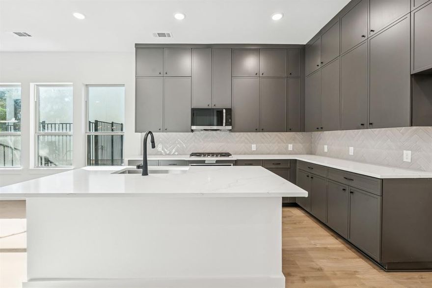 This property may be eligible for up to $10,000 in a Buyer Assistance down payment grant with builder's preferred lender! This is a great opportunity to make home ownership more affordable. Contact agent for more details. Located along the coveted shoreline of Lewisville Lake, Water’s Edge is a luxury, townhome-style, mid-rise condominium residence in Lake Dallas. Nestled amidst a perpetual forest of trees, you’ll discover an oasis of natural beauty with all the urban conveniences and entertainment close at hand. With magnificent lake views and a waterfront deck, you’ll love coming home to Water’s Edge. Final 14 new units are complete and ready for move in. Built by Crescent Estates, they offer 5 different floorplans ranging from 2087 square feet to 2372 square feet, 2 and 3 bedrooms plus game room, study and or loft. Residents also have access to lakefront clubhouse, fitness center & community pool. 428 Waterscape #1338 features the Englewood floorplan. Condos are Fannie Mae approved!