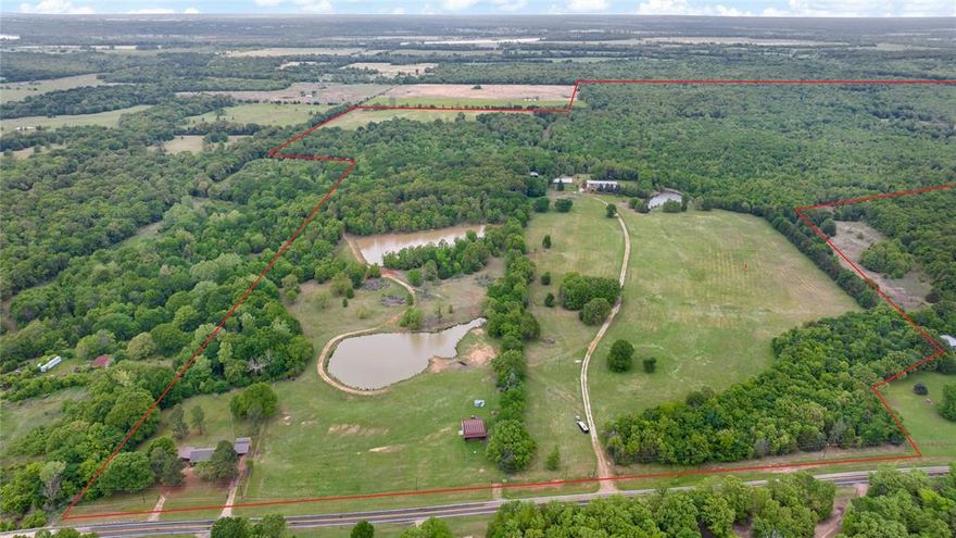 Experience the freedom of wide-open Texas living on this remarkable 398± acre property, anchored by a comfortable 3-bed, 2-bath home and an impressive 125x50 workshop, just built last August, that includes a 10k lb2 lift. There is also a great 80x50 Barn.
This land offers the perfect blend of privacy, recreation, and usable space—ideal for ranching, hunting, or simply enjoying the outdoors.
Rolling acreage stretches in every direction, with a mix of open ground and timber that creates natural habitat for wildlife and endless opportunities for exploring. Several ponds are scattered across the property, providing water sources for livestock, fishing potential, and scenic views throughout the ranch.
The home is practical and inviting, offering a warm, peaceful setting after long days spent working the land or enjoying the outdoors. With three bedrooms and two bathrooms, it’s sized right for full-time living, a weekend getaway, or a base camp for hunting season.
For equipment, hobbies, or serious work, the 80×50 workshop delivers the kind of space that’s hard to find—perfect for tractors, UTVs, tools, storage, or even a custom setup for your operation.
Whether you’re looking for a recreational escape, a working ranch, or a private homestead with room to breathe, this 398± acre property offers the land, the improvements, and the lifestyle to make it your own.

Facts
-398+- Acres 
-3 bed 2 bath single family residence 
-125x50 Workshop 
-10k lb2 lift
-80x50 Barn 

Disclaimer: All information provided herein was acquired from sources deemed reliable and is believed to be accurate. However, we do not warrant its accuracy or completeness and recommend that every item of interest be independently verified by Purchaser.
