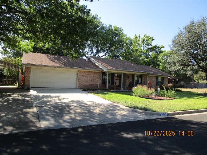 Welcome to this well maintained property in a quiet, established neighborhood with lots of large mature trees. A nicely manicured lawn and landscaping adorn the front yard with a Rain Bird sprinkler system. The front porch is a great place to relax and enjoy any time of day and night. There`s a carport next to 2 car attached garage for extra vehicle coverage. Included are three 65 gallon cisterns utilizing rain gutters for collecting water. An enclosed patio with screened windows is a perfect secluded spot with superb privacy, was added only 3yrs ago and even has a small deck area adjacent to it. Giant trees create fabulous shade in the back yard which has a wood privacy fence. A 10x12 storage shed is located in backyard as well. Interior features Corian countertops, scalloped wood plank flooring and never dump ashes or deal with any smoke again, with the cool, maintenance free, remote controlled electronic fireplace. Third bedroom has accommodations for a home office with cabinets, drawers and countertops for two generous workspaces. Property is very near hospitals, shopping, schools, lake, gyms, worship and easy access to highways and Interstate.