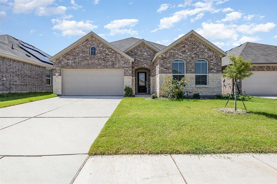 Step into this 3 bedroom, 2 full bathroom,  single-story stunner in a newly developed subdivision, just minutes from Lake Lavon. The open floor plan connects the kitchen, breakfast room, and living room, leading to a covered patio for year-round outdoor relaxation. The owner's suite boasts tall ceilings, a luxurious bathroom with a walk-in shower, and a spacious walk-in closet with two sinks. Two additional bedrooms share a bathroom with a linen closet. A two-car garage and a full-size laundry room with shelves add convenience. The kitchen, a chef's dream, features an island, pantry, microwave, stove, and ample cabinets and counter space. Washer, dryer and refigerator to convey with sale of property.  Plus, the premium upgrade of stone on the front adds to the curb appeal. fantastic community features in the Bridgewater subdivision, including a community pool, clubhouse, jogging and bike paths, a park, and a playground. It's a lifestyle upgrade waiting for you.