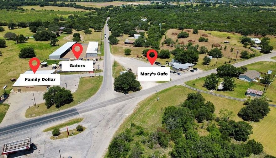 HARD CORNER BETHEL ROAD AND TIN TOP ROAD. WEATHERFORD, TEXAS.   9.37 ACRES, LOTS OF FRONTAGE.  EARLY 1900's FARM HOUSE and CAFE with LOCAL LEGEND TENANT. INCREDIBLE LOCATION!