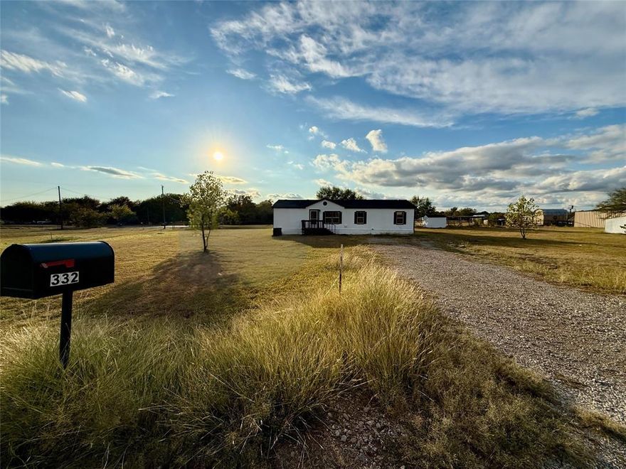 PRICE REDUCED! Welcome to your beautifully updated country retreat!
This spacious 3-bedroom, 2-bath home sits on a peaceful 1-acre corner lot in the quiet Carter Hills community of Parker County. The 1,680 sq. ft. doublewide manufactured home offers an open floor plan with two living areas, a dining room, and an eat-in kitchen bar—perfect for comfortable family living.

Recent updates include fresh interior and exterior paint, new laminate flooring, quartz countertops, LED light fixtures, stylish bathroom tiles and vanities, and more. Enjoy the freedom of no HOA and the savings of your own private water well—no water bills ever!

Relax under the wide-open Texas skies, surrounded by mature trees, or make use of the backyard shed and ready-built animal enclosures for your chickens or small livestock. No restrictions so bring your horses, cows or other farm animals.

Located in desirable Parker County and zoned to Weatherford ISD, this property offers the ideal balance of privacy, space, and convenience—just minutes from town and major roadways.

Final touches are being completed in the next few days—schedule your private showing today!