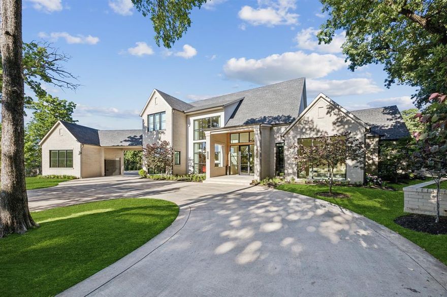 A modern architectural masterpiece in the gated community of Moss Farms, this home blends luxury, function and design across 8100+SF.  Featuring 5 bedrooms, 6.1 baths, and exquisite designer finishes throughout, it's built to impress and crafted for comfort.  Standout features include a floating staircase, office with dual workstations, downstairs media room & large lounge area, and a regulation-size pickleball court.  The full size gym adds an additional 647 SF of dedicated fitness space.  The chef's kitchen is equipped with a separate catering kitchen and accessible outdoor built-in grill and EVO griddle.  The owner's retreat offers true his-and-her spa baths with private vanities, water closets and custom closets.  Three 10' x 20' sliding pocket doors open to a backyard retreat with 3 screened sitting areas, a 23' x 48' pool and spa, firepit, fireplace and a spacious lawn.  A rare opportunity to own a showpiece home that delivers resort-style living at every turn!!  Full amenity list available in the transaction documents.