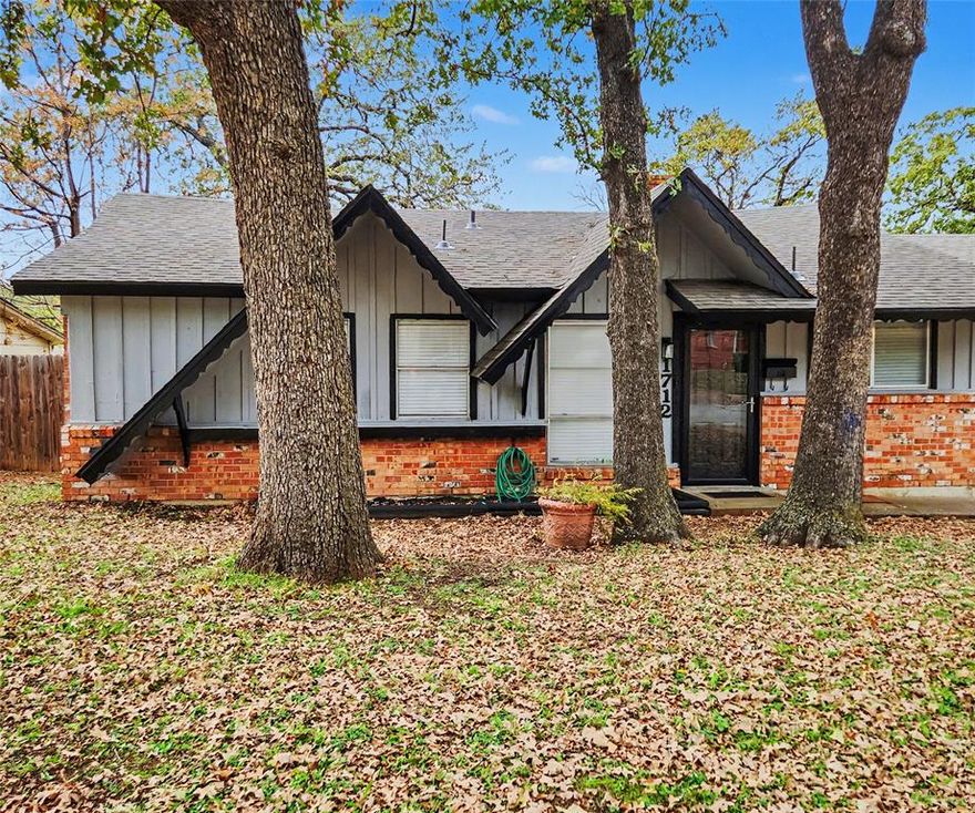 This charming and beautifully updated home is ready for its next family! Recent exterior renovations and beautiful flower beds give it wonderful curb appeal, while inside you’ll find thoughtful updates that make it truly move-in ready.

Step inside to a spacious layout featuring brand new carpet, an updated kitchen, and a converted garage that now serves as a large second living room or den — perfect for movie nights, family gatherings, or a play area for the kids.

With three generous bedrooms, everyone has their own comfortable space to relax. Major updates include a new HVAC system installed in 2016 and a new roof added in 2019, providing lasting peace of mind.

Outside, you’ll love the large front and backyard, offering plenty of room for family barbecues, pets, or simply enjoying the outdoors. The driveway easily fits up to four cars, making parking convenient for guests.

Located in a quiet, established neighborhood, this home is close to 820 and I-30, giving you quick access to top-rated restaurants, retail, gyms, and entertainment options.

If you’re looking for a home that’s been well cared for and full of warmth and space for your family to grow, 1712 Warren Lane is the perfect fit. Schedule your showing today and come see what makes this home so special!