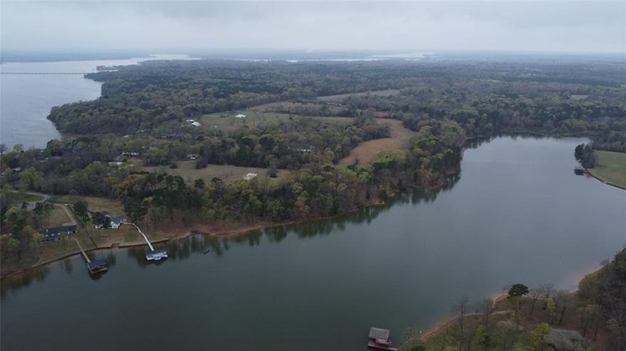 GENERAL DESCRIPTION: This 69-acre tract on Lake Bob Sandlin offers an exceptional blend of space and waterfront living, featuring approximately 2,500 feet of shoreline—nearly half a mile of lake frontage.


The land provides a mix of open areas and mature trees, with multiple scenic homesites and wide water views. Its depth allows for privacy while still maximizing access to the lake.


A key highlight is the two separate points of ingress and egress, offering flexibility for a private estate, family compound, or future development.
Overall, it’s a rare opportunity combining extensive shoreline, usable acreage, and dual access in a highly desirable lake setting.


LOCATION: 2039 Cr 2850, Pittsburg, TX, 75686
~13 Miles to Pittsburg, TX
~13 Miles to Mount Pleasant, TX
~65 Miles to Tyler, TX
~115 Miles to Dallas, TX


WATER: The property has ~2,500 FT. of frontage to Lake Bob Sandlin. There is a wet weather creek that runs through the East part of the property. 


CLIMATE: Pittsburg, TX, averages 47 inches of rain, 225 sunny days, and 1 inch of snow per year. 


UTILITIES: Wood County Electric and Titus County FWSD 1 are the Co-Ops that handle the area. 


WILDLIFE: White-Tail Deer, Hogs, Ducks, Varmints, Turkey


TERRAIN: Property is majority flat with a few rolling hills. 


TAXES: Estimated taxes are $2,499.79


ACCESS: Property has county road frontage to C.R. 2850 and C.R. 2730.