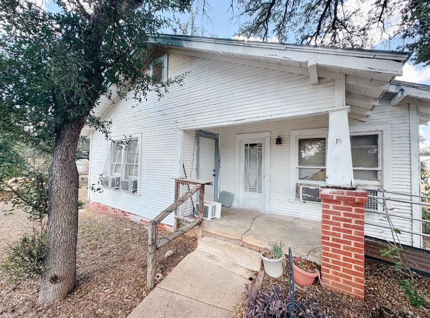 This 3 bed, 1 bath home sits on two lots totaling 0.49 acre, offering plenty of space inside and out. The living room flows into the dining area and kitchen, creating an easy layout for everyday living.

Out back, there’s a separate 1 bed, 1 bath guest house with its own kitchen and living area — great for a rental, guest space, or mother-in-law suite. The property also includes two storage sheds, a patio area, and lots of big shade trees throughout the yard.

With some work, this place could really shine. Whether you're looking to fix up your next home or invest in a potential income-producing property, this one has a lot of potential and room to grow. Being Sold AS IS.