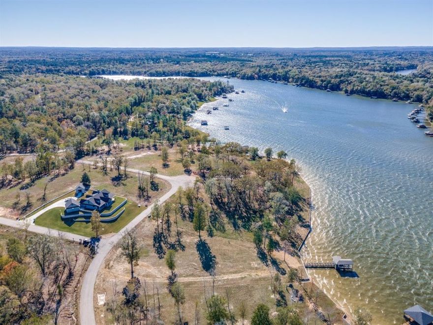 Build your dream lake house on this stunning waterfront lot located in the prestigious, gated community of Southshore at Lake Bob Sandlin. Spanning just under 1.5 acres, this cleared lot is construction-ready, with underground utilities already in place and a new drainage basin featuring two 24-inch drainage pipes to ensure your property is flood-free. 

The lot boasts a brand-new retaining seawall and a fully operational boat house with storage, located on a newly constructed deck completed in November 2024. There's no need to incur expensive costs to get this property ready for building!

The gently sloped lot offers breathtaking sunset views, making it perfect for full-time living or as a weekend retreat. Conveniently situated just a short drive from the DFW area, this property provides easy access to local shopping, dining, and entertainment. Don't miss this rare opportunity to own prime waterfront property in one of the area's newest subdivisions!