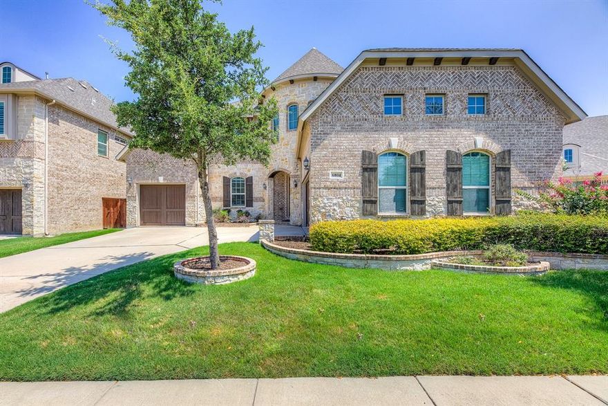 Gorgeous one owner CalAtlantic home in the prestigious Stone Hollow community, located within highly acclaimed Frisco ISD!  From the moment you enter, you are greeted by a grand entryway with soaring ceilings, rich hand scraped hardwood floors, and a winding staircase with iron balusters. A French doored study and formal dining room create a welcoming and elegant first impression. The bright white gourmet kitchen is a showpiece, featuring an oversized island, granite countertops, designer backsplash, stainless steel appliances, gas cooktop, breakfast bar with glass front cabinetry, and a walk-in pantry. The open living area is spacious and inviting, highlighted by a stunning floor-to-ceiling stone fireplace and a wall of windows overlooking the backyard. The private primary suite offers a serene retreat with a sitting area and a curved wall of windows. The luxurious spa-like bath includes dual vanities with marble countertops, a soaking tub, glass enclosed shower, and his and hers walk-in closets. A private guest suite on the main floor adds convenience and flexibility. Upstairs, you’ll find an oversized game or flex room, a modern media room, and secondary bedrooms connected by a stylish Jack and Jill bath. Outside, enjoy an extended stone paver patio and a beautifully maintained backyard perfect for entertaining. A spacious three car garage completes this exceptional home.