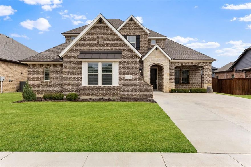 Ideally positioned within the highly sought-after and amenity-rich Southpointe community of Mansfield, this David Weekley home is a rare find. Offering nearly 3,500 square feet of thoughtfully designed living space, the home features four spacious bedrooms, including two conveniently located on the main level. The versatile layout is ideal for large families, hosting guests, multi-generational living, or creating multiple home offices for remote work. Upon entry, you’re welcomed by a grand foyer with soaring ceilings, a striking spiral staircase, and a handsome executive office tucked behind french doors. The elegant kitchen is designed for both beauty and function, featuring a gas cooktop and an oversized island that naturally becomes the heart of the home. The kitchen flows seamlessly into the living and dining areas, creating a warm and inviting space for both everyday living and entertaining. Walls of windows fill the home with natural light, highlighting the durable wood-like tile flooring throughout the main living areas. The spacious primary suite offers a spa-inspired bath with dual vanities, an oversized shower, soaking tub, and a generous walk-in closet—creating a peaceful retreat at the end of the day. Upstairs, a large game room and two additional bedrooms provide flexible space for play, study, or movie nights. The private backyard with a covered patio is perfect for outdoor gatherings and offers plenty of room for a future pool. Residents enjoy exceptional amenities, including a 4,000-square-foot clubhouse, resort-style pool, fishing ponds, parks, playgrounds, and miles of scenic trails, all served by highly regarded Mansfield ISD. Conveniently located near Highways 360 and 287, the home offers easy access to Dallas, Fort Worth, DFW Airport, and countless shopping and dining destinations.