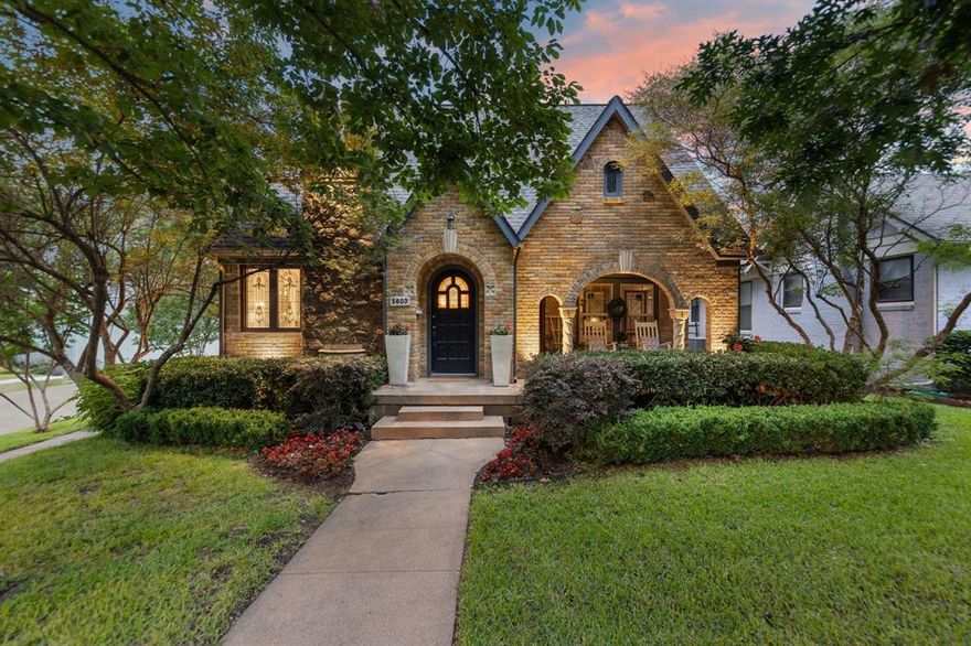 Step into this immaculately restored 1928 tudor home just steps from vibrant Lower Greenville. Tucked on a corner lot on a quiet block, it offers a peaceful lifestyle in the heart of the city. Featuring three bedrooms, three bathrooms and a dedicated office, this charming home was completely remodeled in 2012 while honoring the original architecture and design.

This jewel box of a home features original hardwood floors and stained glass. As one of the builder's show homes in the 20s - it boasts multicolor brick, a Bacchus fountain, and spiral columns on the inviting front porch. Large trees, mature landscaping and a koi pond off the generously sized porch - framed with arches and anchored by a fireplace—further enhance the home's charm. The backyard features a newly rebuilt, detached two-car garage and a motorized side gate for privacy.

Inside you will find two living areas: a formal living area with a wood-burning fireplace and an antique chandelier shipped from Prague, and a casual living area off the kitchen. Honed soapstone counters ties together the vintage inspired kitchen that features modern amenities. A formal dining area honors the house's original structure with a period brass light fixture, and features a large bay window overlooking Worcola, where many neighbors can be found walking and running.

The first floor office has its own private entrance off the front porch and a full bath with original floor tile, sink and mirror. Upstairs, there are three bedrooms and a laundry room. The primary suite is generously sized and has a balcony overlooking the backyard. The light filled primary ensuite is modern yet traditional in design. 

Once home to the infamous Dallas journalist Stoney Burns - founder of Dallas Notes and Buddy Magazine, this home holds many stories. Its history has been lovingly preserved and updated with modern conveniences and is ready for the next owner. Feeding into coveted Mockingbird Elementary, this home checks all the boxes.