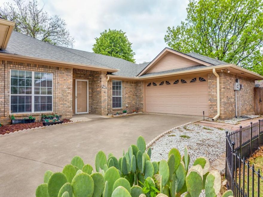 Welcome to this inviting single-story brick home nestled in the heart of Granbury, Texas, where small-town charm meets everyday convenience. From the moment you arrive, the extended driveway, mature trees, and low-maintenance landscaping create a warm and welcoming first impression. Inside, you’ll find a light-filled, open-concept layout featuring vaulted ceilings, neutral tones, and a spacious living area that flows seamlessly into the dining space and kitchen—perfect for both relaxing evenings and entertaining guests.

The kitchen offers abundant cabinetry, ample counter space, and a functional layout with a breakfast bar overlooking the main living area. Adjacent dining and living spaces are enhanced by large windows and a glass door that provide natural light and views of the private backyard. The primary suite features dual vanities, generous storage, a soaking tub, and a separate shower, creating a comfortable retreat at the end of the day. Additional bedrooms are well-sized and versatile, ideal for guests, family, or a home office.

Step outside to enjoy a cozy patio with pergola, perfect for outdoor dining or quiet mornings, along with a fenced yard designed for easy upkeep. Located just minutes from Granbury’s historic downtown square, residents can enjoy local wineries, boutique shopping, live entertainment, and waterfront dining along Lake Granbury. With frequent festivals, farmers markets, and community events, this area offers a vibrant lifestyle with a relaxed pace. This home presents an excellent opportunity to enjoy comfort, functionality, and the unique charm of Granbury living.