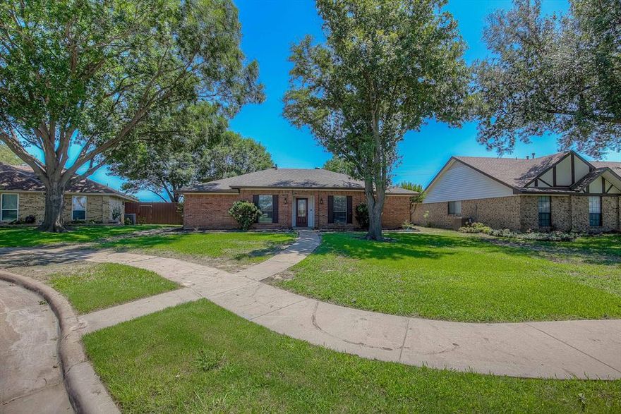 Welcome to this beautiful 3-bed, 2-bath home in Lewisville. Nestled in a picturesque neighborhood, it features a lovely front yard with few trees. Inside ceramic tiles and carpet greets you. The eat-in kitchen boasts built-in cabinets, a fridge, and granite countertops. Enjoy meals in the dining room or relax in the spacious living room with vaulted ceilings and a brick fireplace. The master bed offers dual sinks, granite countertops, a separate shower, and a walk-in closet. 2 additional bedrooms and a 2nd full bath with granite countertops provide ample space. A separate utility room with a full-sized washer and dryer, and built-in cabinets adds convenience. The wood-fenced backyard with a covered patio is perfect for gatherings. With a 2-car garage and a carport for two more cars, this home combines comfort, style, and practicality. Make it your dream home today! All Westrom Group residents are enrolled in our RESIDENT BENEFIT PACKAGE (RBP). Please view our website for more details.