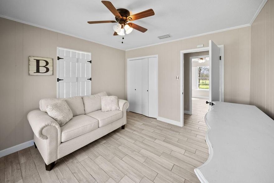 Welcome to your own slice of East Texas charm in Alba, where space, flexibility, and country living all come together on 2 beautiful acres! This cute and updated 4 bedroom, 2 bath home offers a warm and inviting feel from the moment you walk in, with a cozy living room centered around a wood burning cast iron fireplace that truly feels like home. The kitchen has been thoughtfully updated with granite countertops, a window above the sink that brings in natural light, plenty of cabinetry, and great pantry space for everyday functionality. Throughout the home you will find durable tile flooring designed to look like wood, giving you the aesthetic you want with the low maintenance lifestyle you need. All four bedrooms are comfortably sized with solid closet space, and the two bathrooms are well laid out for easy living. Outside is where this property really starts to stand out. In addition to the main home, there is a large detached two car garage and a true bonus, a Satterwhite log cabin complete with its own bedroom, full bathroom, kitchen, and washer and dryer hookups. Whether you are looking for a mother in law suite, guest space, or a potential income producing Airbnb, this setup gives you flexibility, especially being just minutes from Lake Fork. The property is fully fenced with a gated entrance and offers plenty of room to roam. This is the kind of property that checks a lot of boxes, whether you are looking for a primary residence, an investment opportunity, or both. If you have been searching for that perfect mix of charm, land, and versatility in East Texas, this one is worth a look!