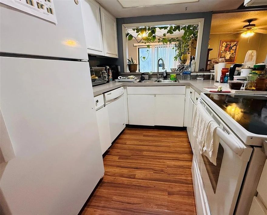 Welcome to 2610 Santiago Circle, a well-located 4-bedroom, 2-bath townhome in the heart of Grand Prairie. This inviting home offers a functional layout designed for everyday living, relaxing, and hosting guests. The interior features comfortable living and dining spaces with natural light throughout. The kitchen provides ample cabinetry and workspace, making meal prep and gatherings easy and efficient. All four bedrooms offer versatility for a variety of needs, while the two full bathrooms are thoughtfully positioned for convenience. Enjoy a low-maintenance lifestyle with the benefits of townhome living, all just minutes from Mountain Creek Lake, nearby parks, and an array of shopping and dining options. With quick access to major roadways, commuting to Dallas, Arlington, or surrounding areas is simple and convenient.