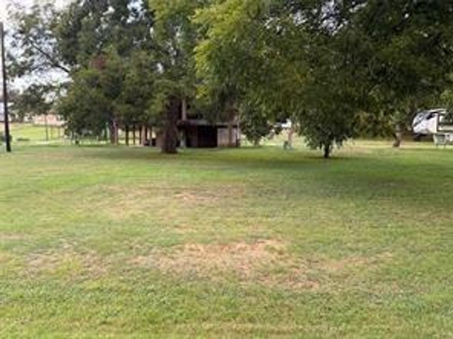 2 Lots included in this property, just across from the Brazos River, ready for your use!  Use for a summer or weekend retreat with your RV, or build to suit.  Mobile homes allowed.  Wide range of opportunities for use!  The community has a boat ramp for residents, golf course, pool, clubhouse with restaurant & other amenities available.