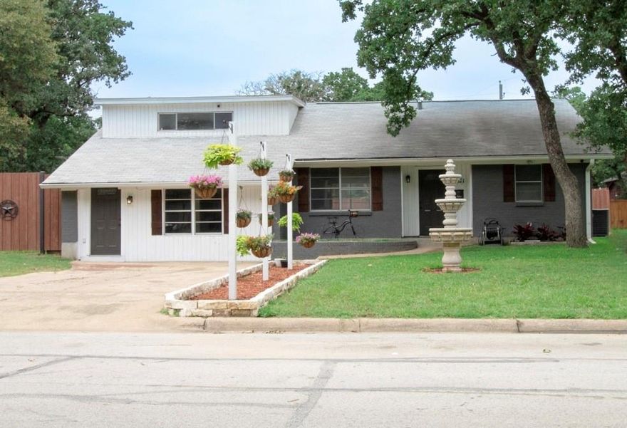 Welcome home! Seller's offering $7k towards closing costs, updates, or towards your rate buy down!! Your new home sits on a large corner lot with plenty of yard in both the front and back! Just 4 minutes from I-20! New carpet in bedrooms, new ceiling fans installed, new fixtures and freshly painted inside! The kitchen features granite counters and stainless steel appliances including a brand new stove and brand new microwave. Nice working fountain in the front yard. Garage conversion is a great second living room with plenty of room! Refrigerator will remain with full price offer.