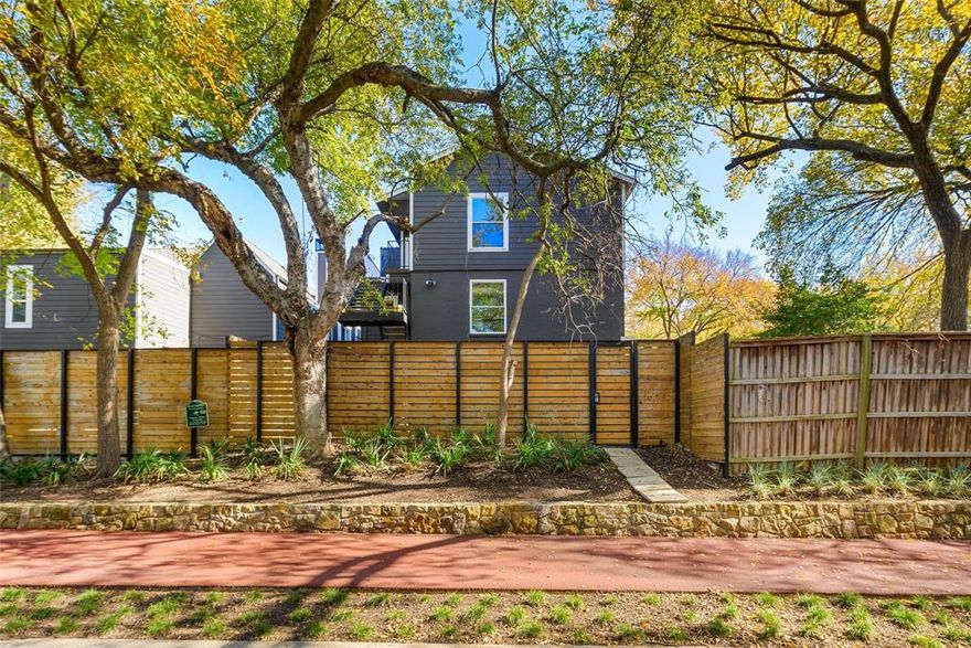 Located on KATY TRAIL, this sleek and updated, three story condo is within a small complex featuring gated & direct access to the trail. A one car garage on Oliver has extra storage & your front door entry from Buena Vista is located behind a security gate. Open living, dining, & kitchen areas are located on the second level. The kitchen features dark cabinets, black granite countertops with a stacked stone back splash, a wine rack & breakfast bar for easy entertaining. One full bathroom including a shower, plus a walk in closet are also located on the second level. The spacious primary bedroom with a large walk in closet are on the third floor with an en suite bathroom featuring a large tub & shower. The first floor Bosch Washer & Dryer and a  BBQ grill can be included. Relax in the property's Common area with outdoor seating, a fire pit, and gated access to Katy Trail or take a walk to Trader Joes, Travis-Knox restaurants and shops. This condo is move in ready to enjoy Urban living in one of Dallas's most desireable neighborhoods.