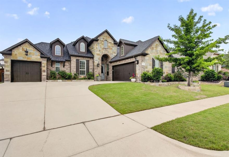 Located in the highly desirable Hidden Vistas neighborhood within sought-after Burleson ISD, this beautifully maintained 4-bedroom, 3.5-bath home offers over 3,000 square feet of thoughtfully designed living space with a 3-car garage, upstairs spacious family room perfect for entertaining or multigenerational living.
From the moment you arrive, you’ll notice the stunning curb appeal, custom cabinetry, plantation shutters, stained concrete flooring, upgraded lighting, and designer finishes. The open-concept kitchen features all new appliances, a large island, and flows seamlessly into the living area anchored by a gorgeous rock fireplace with custom built-ins and gas logs.
The private primary suite offers a relaxing retreat with a large walk-in closet. You’ll appreciate two additional bedrooms and a designated office on the first level while the upstairs provides a large flex family room, study nook, full bathroom and a fourth bedroom.
Step outside to your own backyard oasis featuring a heated saltwater pool and spa, covered patio with fireplace, extra decking for entertaining, and beautifully maintained landscaping. Additional highlights include a 2-year-old roof, new AC unit with transferable 10-year warranty, foam insulation, sprinkler system, electric blinds in the living room, permanent Govee exterior lighting, fresh stained fence, large walk-in attic storage, and custom mudroom and laundry room cabinetry.
This exceptional home blends comfort, functionality, and resort-style outdoor living in one of Burleson’s most desirable communities.