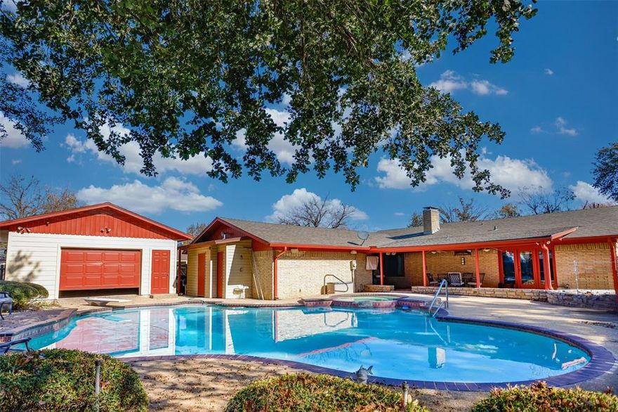 POOL PLUS BONUS GARAGE!  Welcome to this charming 3 bedroom 2 bath gem nestled on a spacious corner lot.  Fresh trim paint, new windows, gutters and beautiful landscaping give this home standout curb appeal, while inside you will find new tile flooring in the kitchen, hall and baths.  Two living areas add space and comfort to entertain friends and family.  The kitchen impresses with its classic wooden shutters, dual pantries, and abundant storage space.  Enjoy walk in closets, a large utility room provides extra space for a freezer, and a versatile 22 x 20 bonus shop or extra garage that is perfect for hobbies or storage.  Additional highlights include a security system for peace of mind, pocket doors, and 15 in of new attic insulation.
Step outside to your private oasis featuring a gorgeous in ground heated pool and spa, complete with a half bath and outdoor shower for convenience.
Don't miss this incredible home! Call today!  
No Survey, Buyer to purchase if needed.  Refrigerator, TV and grill on the patio will convey.  New roof to be installed on house and shop.