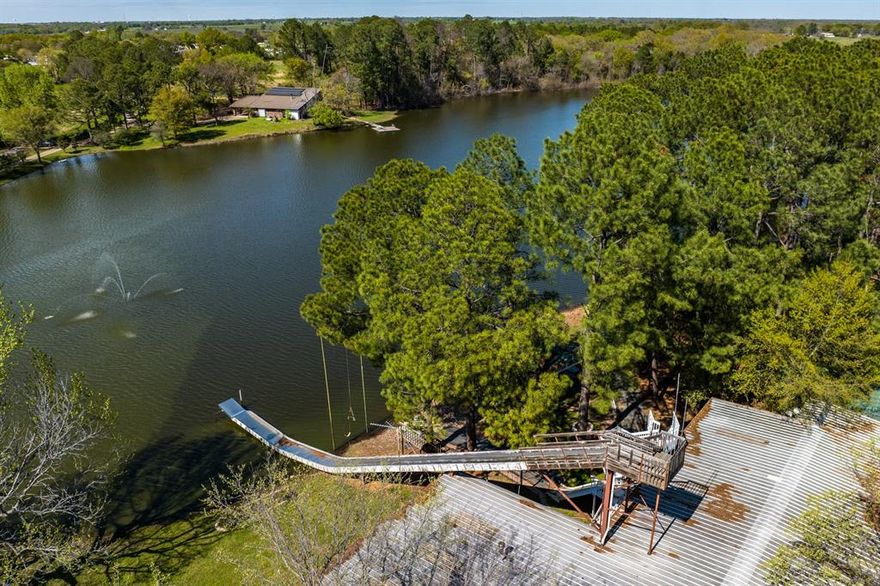 Arrive by car or helicopter to Gun Barrel City in East Texas where life is good! A growing resort town on Cedar Creek Lake that has become the commercial, retail and entertainment hub for the area. Enter Sunflower Ranch to be greeted by spectacular views along the tree lined paved drive leading up to the 18 acre lake. Fishing, horseback riding, farming, or just relaxing are a few things to do on app 160 Ac Ranch. Located just off the eastern side of the Lake and only 55 miles SE of DFW. With new schools, incredible restaurants, live music, shopping and lakefront activities. You will find this property is well suited for numerous uses including a family retreat, working ranch, or sub-divided for new home development. Move into one of 4 homes surrounding the lake and enjoy your morning coffee before heading out to explore everything this property has to offer.3 Ponds, Workshop, Horse Barn with Stalls, Tack Rm, Equip. Barn and Greenhouse and private landing strip!