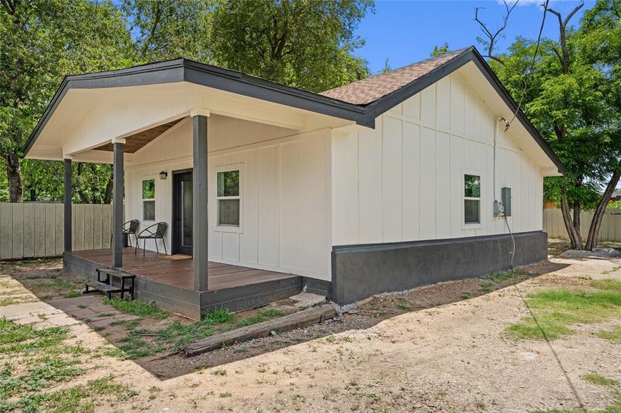 Step inside this beautifully renovated 2-bedroom, 1-bath home offering 941 sq ft of carefully curated style and comfort. Blending rustic warmth with modern finishes, this home makes a bold statement with its open layout, rich wood accents, and pops of personality.

The kitchen is a showstopper — featuring fresh mint green cabinetry, quartz countertops, open shelving, and a bold wood beam entry that gives the space character and charm. The bathroom mirrors the same intentional design with a walk-in glass shower, marble-look tile, gold fixtures, and a custom vanity that ties in the home's unique palette.

Other highlights include luxury vinyl plank flooring throughout, new windows bringing in natural light, and a cozy front porch perfect for your morning coffee. The exterior has also been given a sleek modern upgrade with fresh siding, black trim, and a spacious yard ready for personalization.

Don’t miss your chance to own this one-of-a-kind home — schedule your showing today!