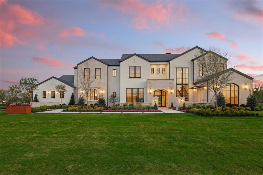 Modern Luxury Estate in Argyle on 2 Acres

Step into modern sophistication with this brand-new 6,900 sq ft architectural masterpiece by Denton Creek Builders located in the sought-after Argyle ISD. Nestled on 2 sprawling acres, this estate blends elegance and functionality, designed for luxury living and refined entertaining.

As spring breathes life into North Texas, enjoy blooming views from the stunning interior glass-wall study or soak up sunshine in your private courtyard featuring designer landscaping and contemporary fountains.

The home boasts 5 spacious bedrooms and 5 full baths, complemented by 2 elegant powder rooms. Dual staircases frame the expansive entry, leading to a stunning upstairs game room with built-in bar, a cozy playroom, and a balcony perfect for watching sunsets. Downstairs, the open-concept layout flows through a chef's kitchen, wine room, and light-filled living areas with floor-to-ceiling windows.

Host summer gatherings under the outdoor kitchen with patio fireplace and retractable screens—ideal for indoor-outdoor living year-round.