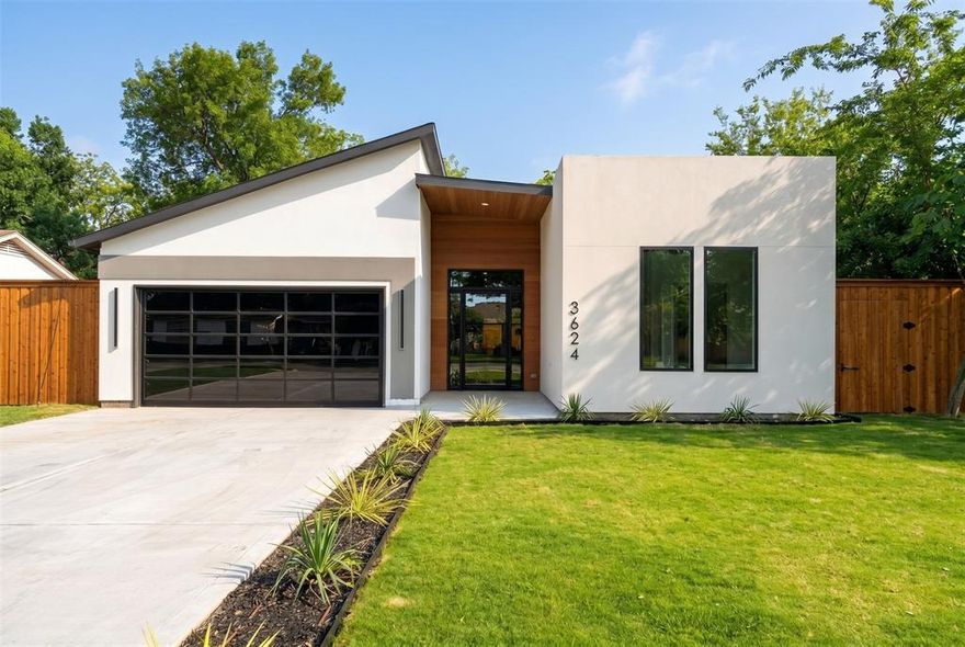 Experience elevated living in this highly sought-after floor plan—where modern elegance meets everyday functionality. This 4-bedroom, 3-bath luxury home showcases refined contemporary design throughout. A striking iron-and-glass front door welcomes you into a grand 8-foot entrance hallway that opens to a spacious living area with soaring 10-foot ceilings and abundant natural light. Expansive sliding patio doors create a seamless indoor-outdoor connection, perfect for both relaxation and entertaining.
At the heart of the home, the gourmet kitchen features custom modern cabinetry, premium finishes, and a generous waterfall island designed for both functionality and style. The primary suite is a private retreat complete with floating vanities, dual showers, and a soaking tub for spa-like comfort. Thoughtfully designed secondary bedrooms, each featuring custom closets, offer flexibility for guests, family, or a home office.
With 2,692 square feet of thoughtfully designed living space, this home embodies comfort, sophistication, and convenience—just minutes from Dallas Love Field, Central Market, Inwood Village, and scenic Bachman Lake Park. Blending luxury finishes with functional design, this exceptional residence offers the perfect balance of style, comfort, and prime Dallas living.