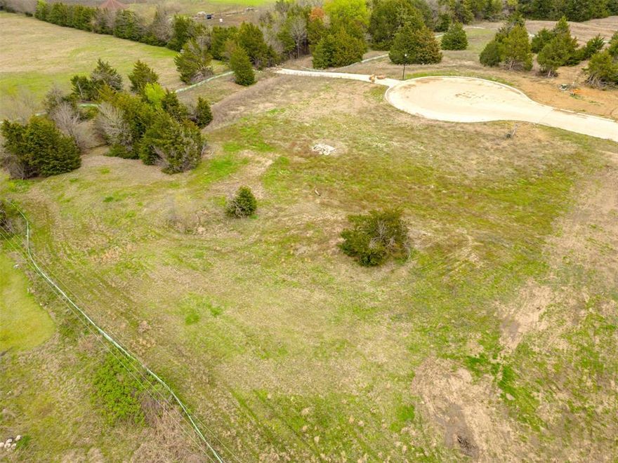 WHISPERING WINDS 1 PLUS AC. TRACTS .COME PLANT YOUR ROOTS IN CADDO MILLS! COUNTRYSIDE VIEWS NOT YOUR OPEN LAND TRACTS. HERE ARE THE DIFFERENT ARCHITECTURAL DESIGNS NOT EASY TO FIND. REQUIREMENTS 75% HARDIEPLANK , CEDAR SHAKE OR BATT & BOARD SIDING AND ONLY 25% STONE AND OR PAINTED BRICK , STYLES LIKE CRAFTSMAN, SOUTHERN COTTAGE, MODERN FARMHOUSE, TEXAS TRADITIONAL AND TUDOR. MINIMUM SQ. FOOTAGE FOR ONE STORY 2000 SQ. FT. AND 2500 SQ. FT FOR A TWO STORY. METAL BLDGS AND DETACHED GARAGES, MIN 2 CARS, MAX 6 CAR GARAGE ARE ALLOWED, BUT MUST CONFIRM WITH THE DESIGN & HARMONY OF THE MAIN STRUCTURE. WATER, ELEC., FIBER OPTIC ON SITE. PROPANE ALLOWED MUST BE BURIED.START BUILD WITHIN 2 YEARS. VERY FEW SUBDIVISIONS WITH CONCRETE ROAD. LOCATED IN SOUGHT AFTER CADDO MILLS ISD.